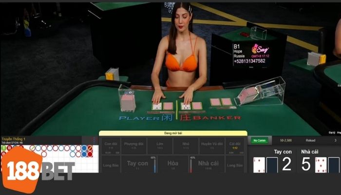 Giao diện trực tiếp Baccarat Sảnh Sexy 188BET với dealer bikini quyến rũ, tạo không khí chơi bài sống động và hấp dẫn.
